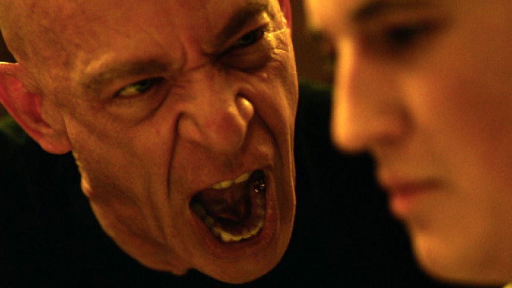 JK Simmons' Fletcher reveals that he's a vampire and attempts to devour Andrew. Actually, he just swears at him a lot